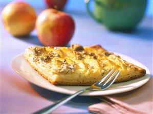 Piece of apple cake with poppy seed crumble