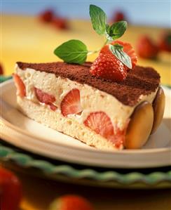 Piece of strawberry tiramisu gateau with trifle sponges