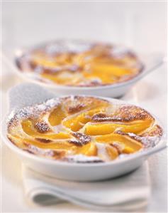 Peach brulee with icing sugar