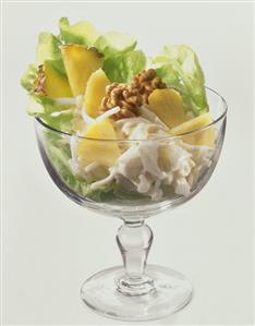 Waldorf salad with pineapple and walnut kernels