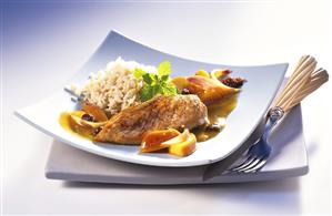 Chicken breast fillets with apple curry sauce and rice