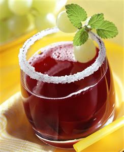 Grape punch in glass with sugared rim