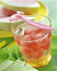 Melon punch with lemon balm leaves