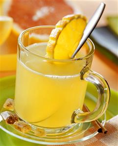 Grapefruit and orange punch in glass cup