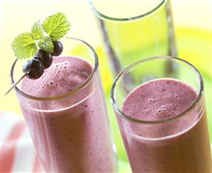 Blueberry soya shake, garnished with lemon balm