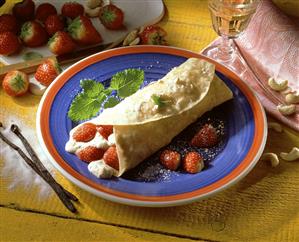 Strawberry blancmange wrap with icing sugar