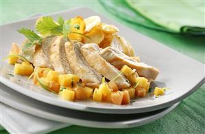 Chicken fillet with marinated fruit and baked potatoes