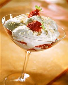 Strawberries with cream mousse in dessert bowl