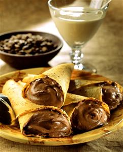 Crepes with chocolate mousse filling, mocha beans, coffee cream