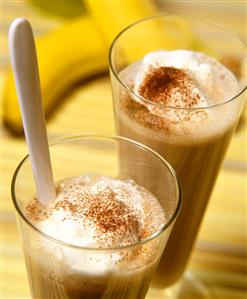 Chocolate shakes with cream; bananas