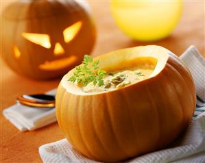 Pumpkin soup with pumpkin seeds for Halloween