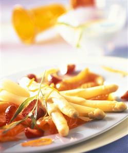 White asparagus with strawberries, salmon & orange sauce