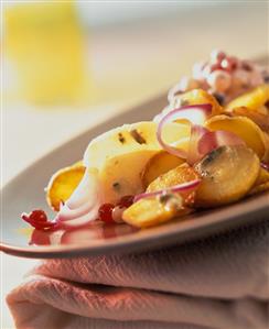 Pear-shaped potato croquettes with cranberries, onions & cheese