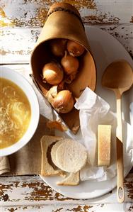 Onion soup with ingredients (onions, white bread, cheese)