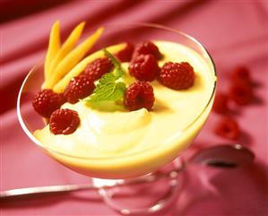 Mango yoghurt mousse with fresh raspberries