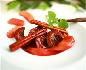 Autumn fruits with yoghurt sauce and cinnamon