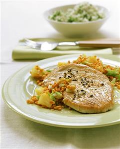 Turkey escalope on lentils with pineapple; rice