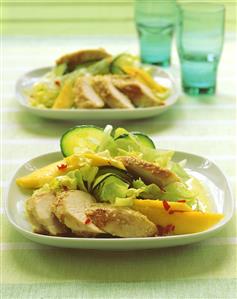 Chicken salad with mango, cucumber and iceberg lettuce