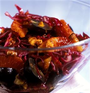 Red cabbage salad with grapes, oranges and walnut kernels