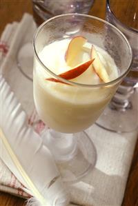 Apple & champagne sorbet in glass: decoration: goose feather