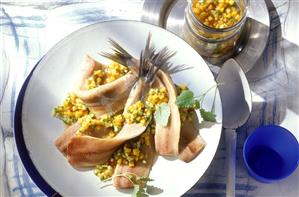 Matje herrings with mango salsa and lemon balm