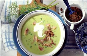 Pea soup with matje herrings, pumpernickel crumbs & sour cream