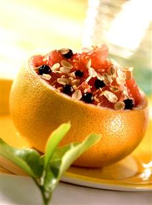 Grapefruit stuffed with oat flakes and blueberries