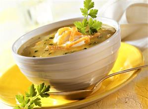 Potato soup with salmon and sour cream in soup bowl (1)