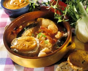 Bouillabaisse with slices of bread