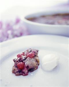 Berry brulee with papaya and vanilla ice cream