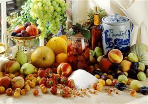 Still life with rumtopf and fresh fruit