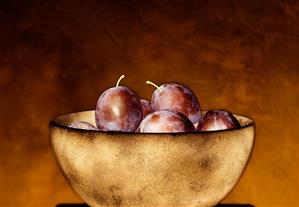 Plums in dish