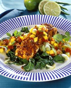 Barbecued salmon with mango salsa and chard