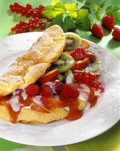 Omelette with fruit and yoghurt sauce