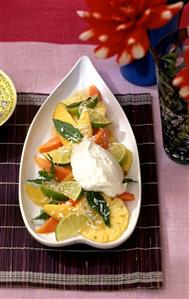 Exotic fruit salad with coconut cream