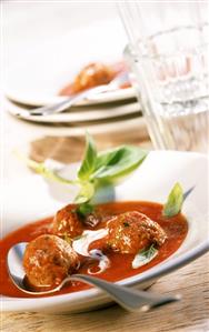 Tomato soup with meatballs and crème fraiche