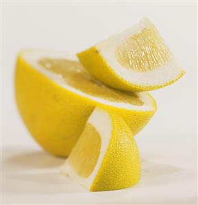 Half a pomelo and wedges of pomelo