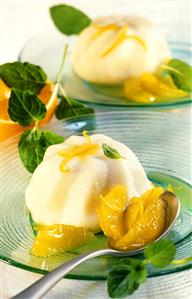 Semolina flummery with orange sauce and fresh mint