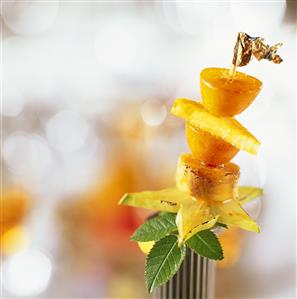 Fruit kebab with fried exotic fruit