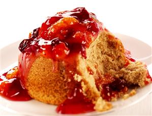 Bread pudding with cranberry and mandarin sauce