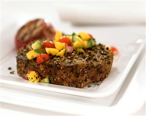 Steak with pepper and mango salsa