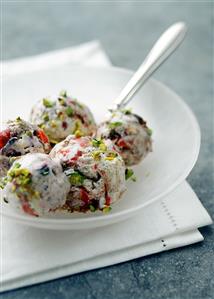 Ice cream with fruit and pistachios