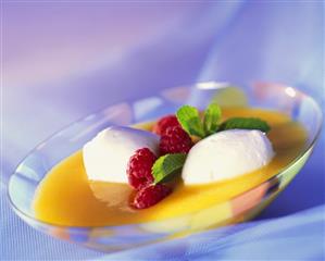 Apricot soup with buttermilk mousse, raspberries and mint