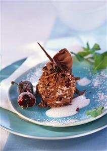 Chocolate cherry ball with marzipan sauce