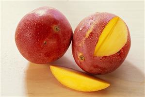 Mangos (Sensation variety) with drops of water