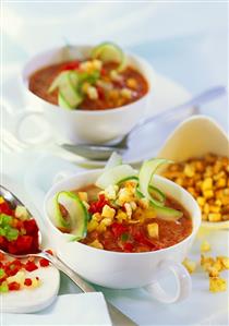 Cold vegetable soup with spicy croutons in two cups