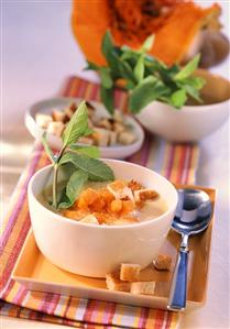 Apple and pumpkin soup with mint and croutons