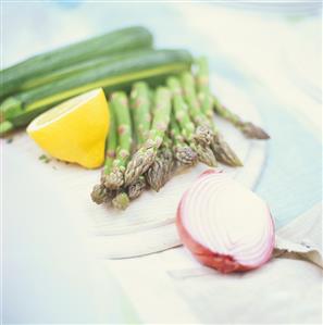 Green asparagus, courgettes, onion and lemon