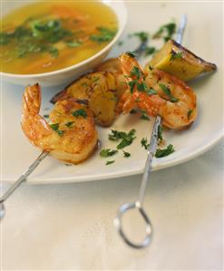 Fish soup with shrimp kebab