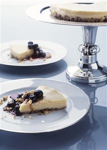 White chocolate tart with blueberry sauce